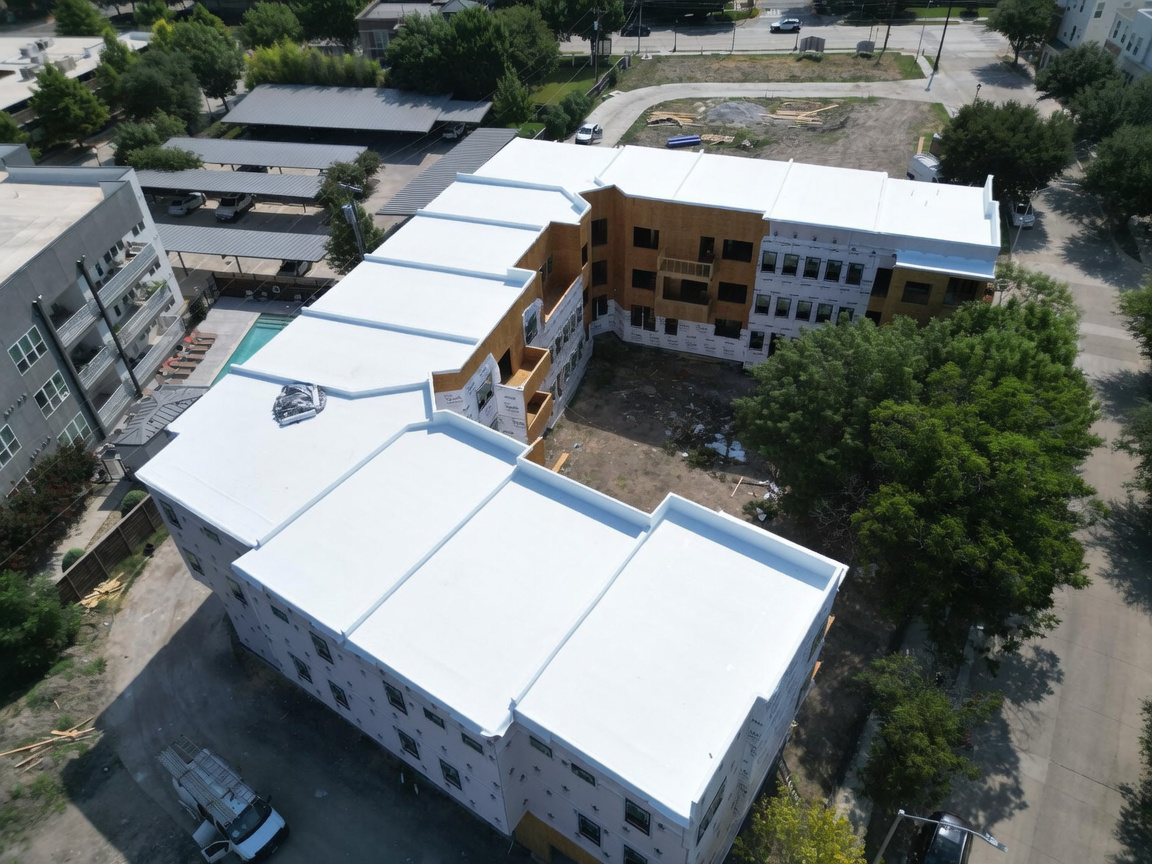 Commercial Flat Roof Replacement - Large-scale TPO system replacement